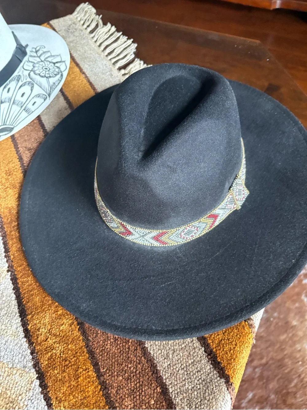 Women’s Black felt Hat with Beaded Band and Women’s White Straw hand Painted Hat
